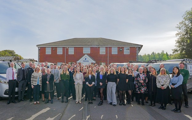 Gateway employees full portrait outside Gateway House office